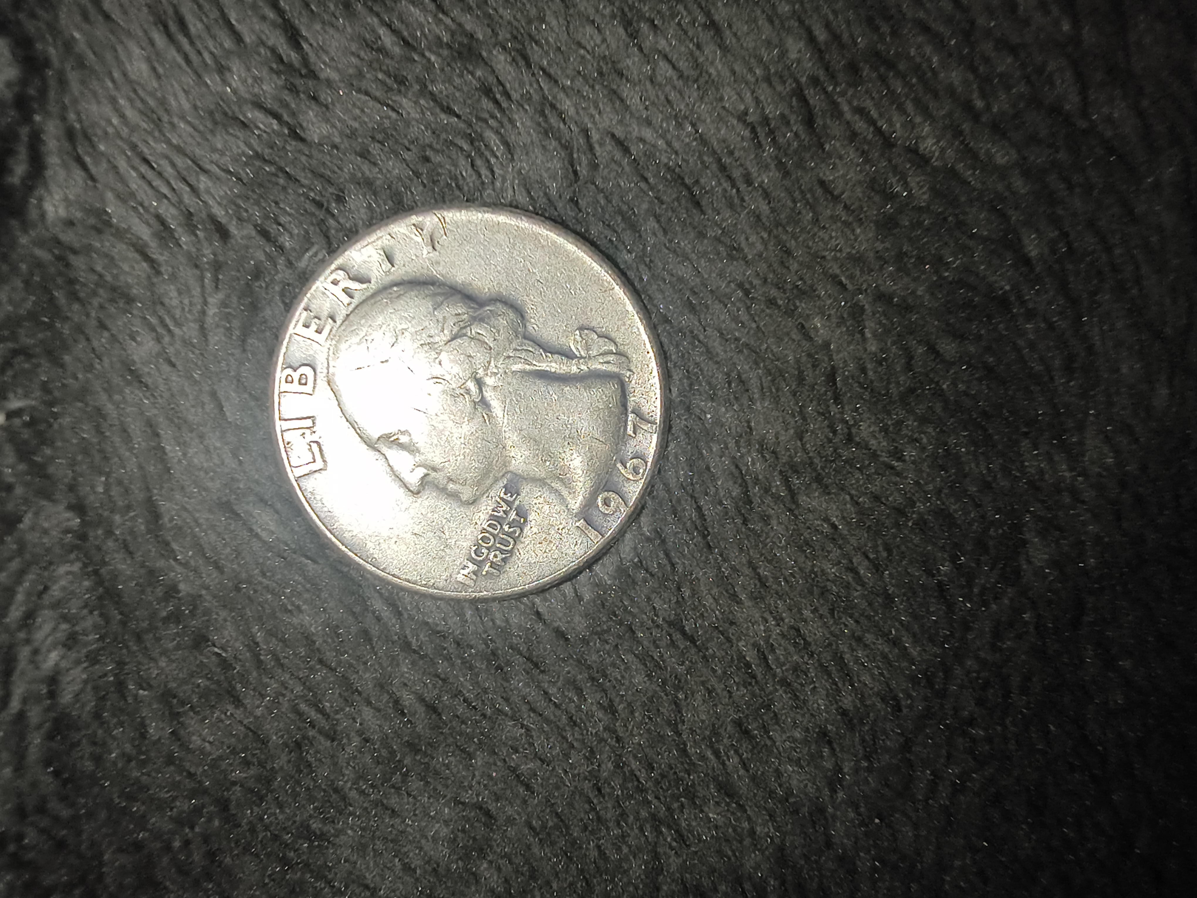 It's a 1967 silver quarter