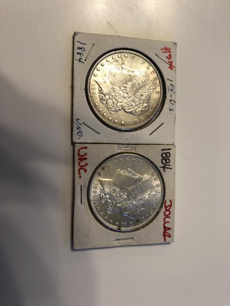 Two 1884 silver dollars