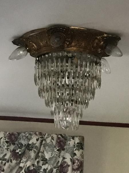 Early 20th century light which is gold and&hellip;