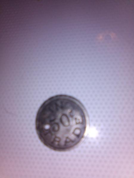 COIN FRONT: IN 50¢ TRADE HAS A HOLE&hellip;