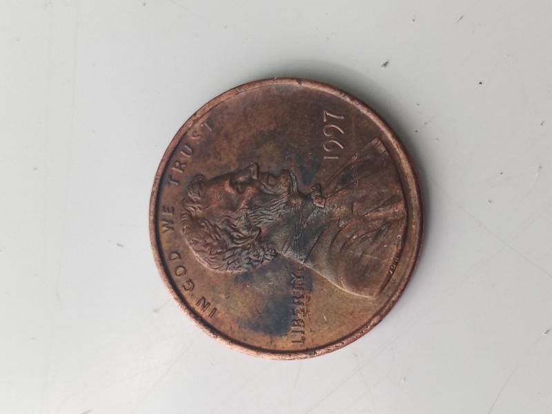 Very strange coloring unlike other 1997 Lincoln pennies