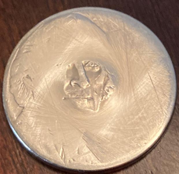 Nickel. Can not make out date or anything.
