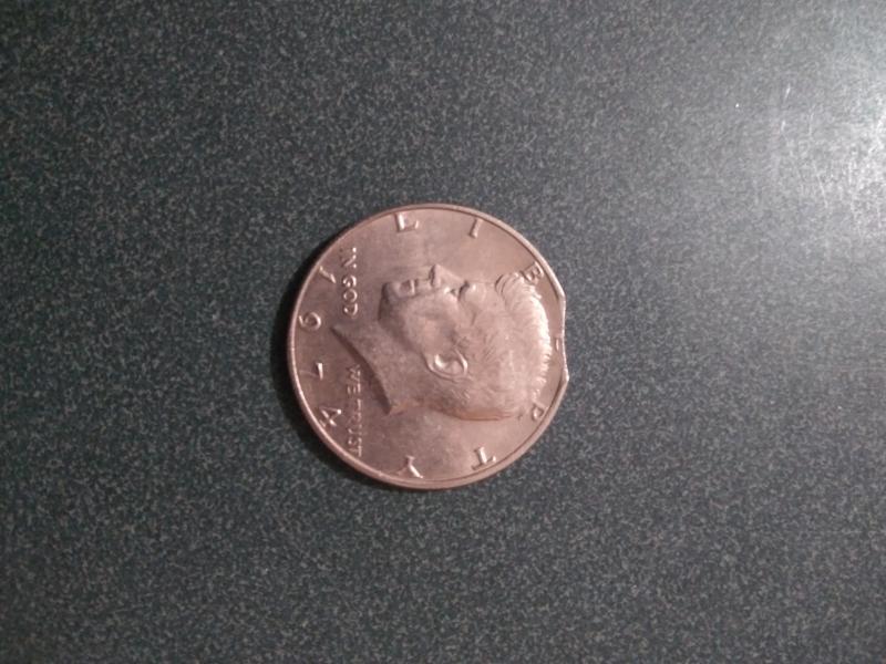 1974 P kennedy half dollar on chipped planchet