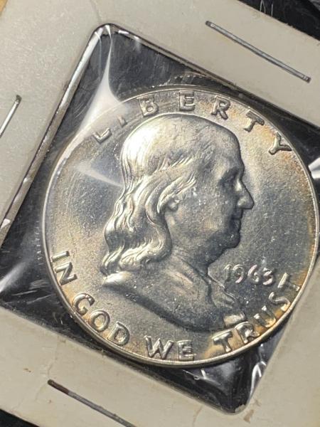 Ungraded uncirculated 1963 P Franklin half dollar with…