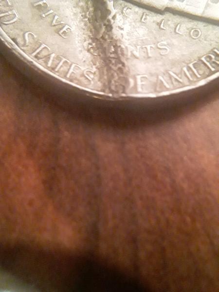 1964 Jefferson nickel special strike with die cudd