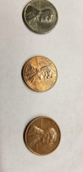 one 1943 steel penny 0ne 1977-D copper penny&hellip;