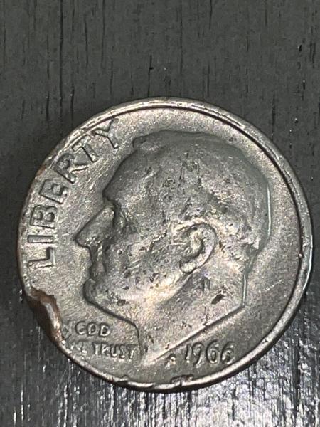 A 1966 U.S. dime with a possible rim&hellip;