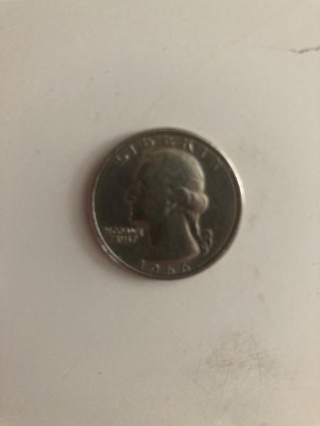 Double headed quarter on side has date 1966&hellip;