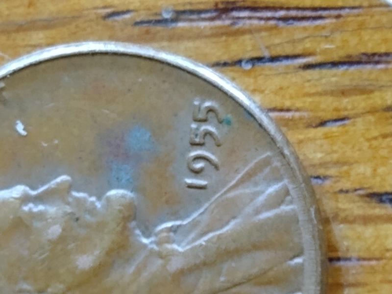 A 1955 penny That weighs 2.8 grams.