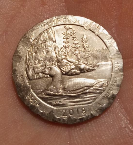 2018 quarter. Scratches visible depending on angle of…