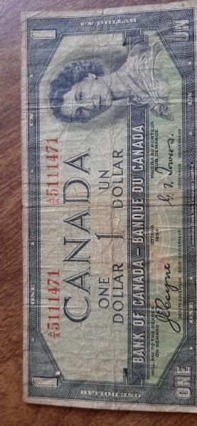 Older Canadian one dollar bills. Any value....