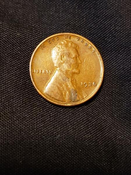 1936 No mint mark wheat penny. I believe…