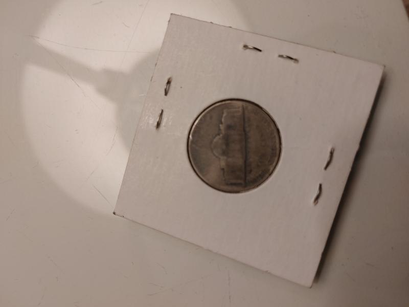 1944 jefferson nickel ,his hair is imprinted and…