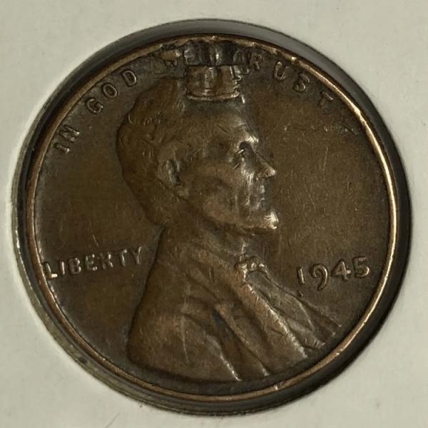 1945 wheat Lincoln cent with what I believe…