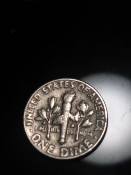 This is a 1965 silver dime with the&hellip;