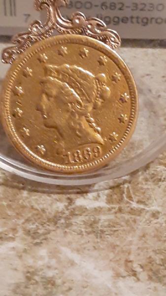 1868 2 1/2 gold dollar coin.