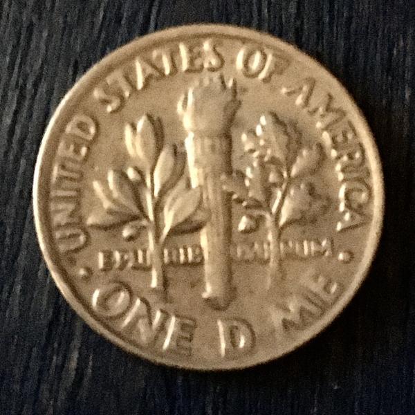 1985 D dime with I missing .