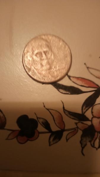 Rare nickel. Gold in color