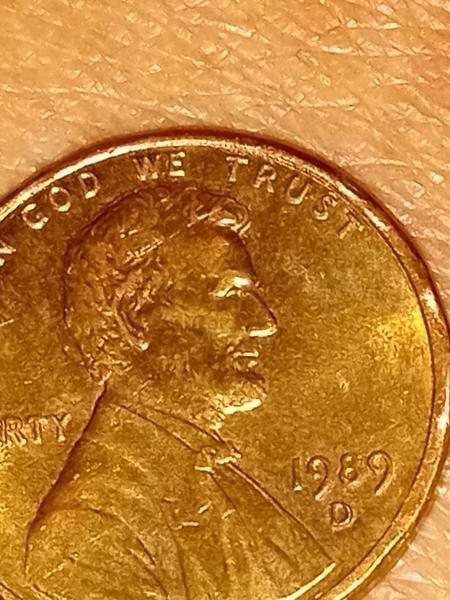 It is cooper it weighs 3.11 grams