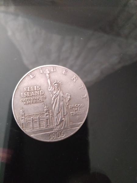 1906 Ellis Island silver dollar