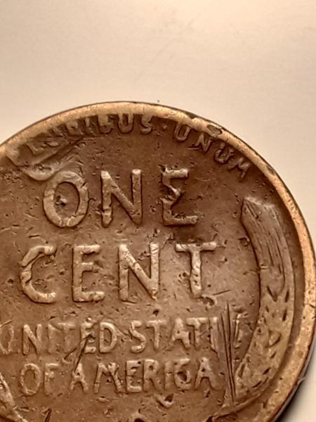 The E in ONE on the reverse side&hellip;