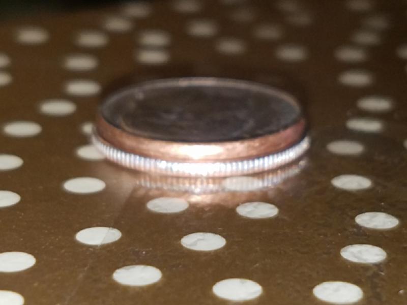 The dime is smaller than a regular dime.&hellip;