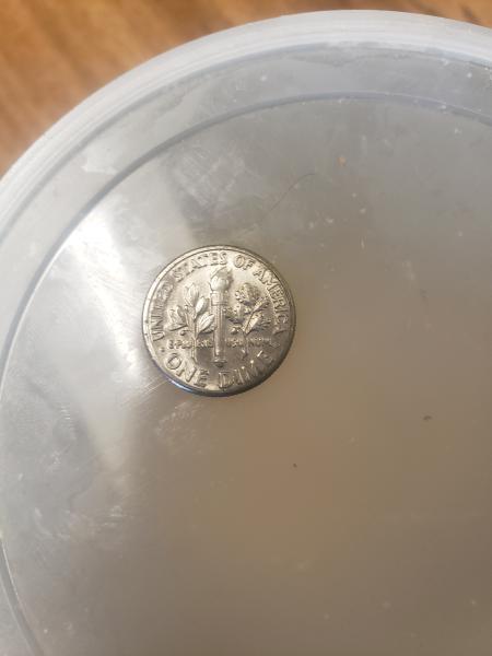1987 dime with odd uneven surface across the&hellip;