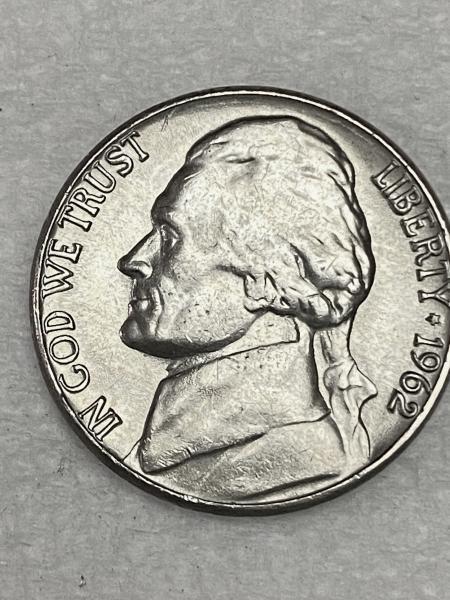1962 D UNC Nickel with steps. Wondering if…