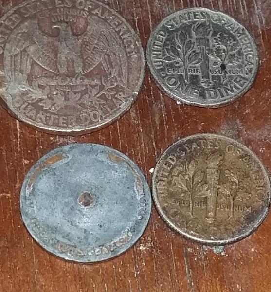 A 1997 quarter that has a piece of…