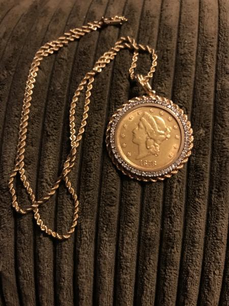 1878 Gold $20.00 coin with around 40 diamonds&hellip;