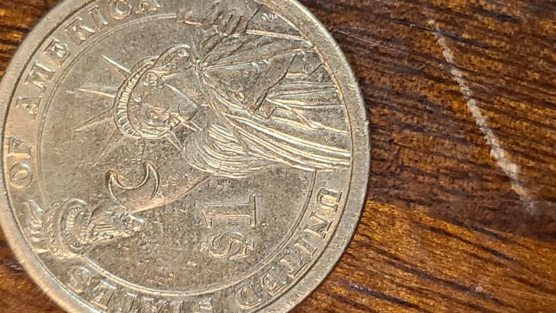 2007 James madison dollar coin with a crescent&hellip;