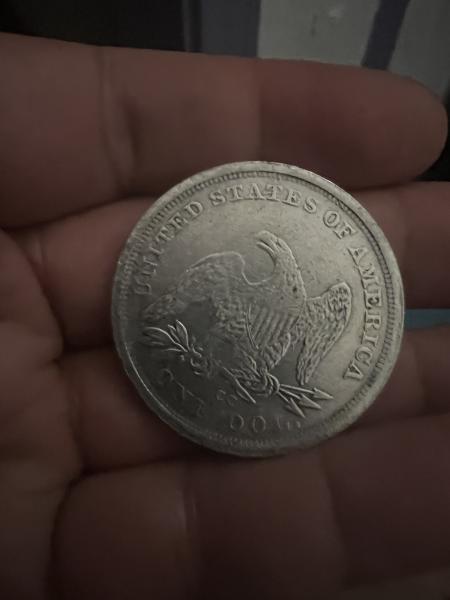 1865 seated silver dollar