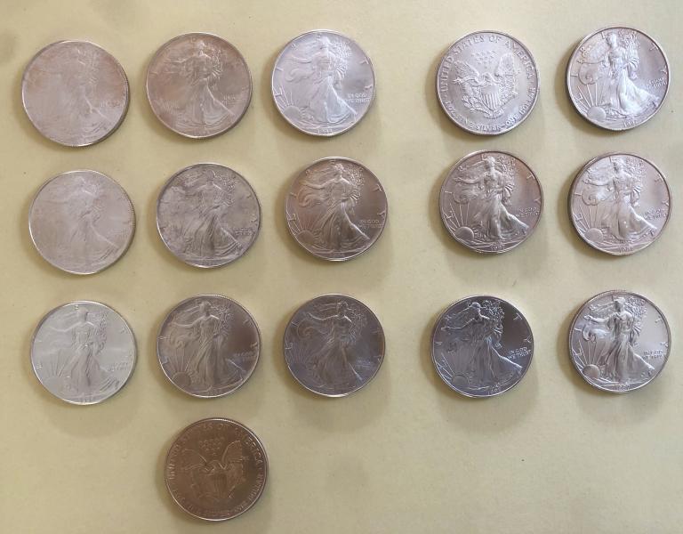 16 uncirculated silver dollars, some with light tarnish&hellip;