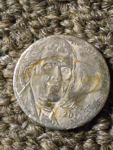 Top two photos are a 2018 Jefferson nickel…