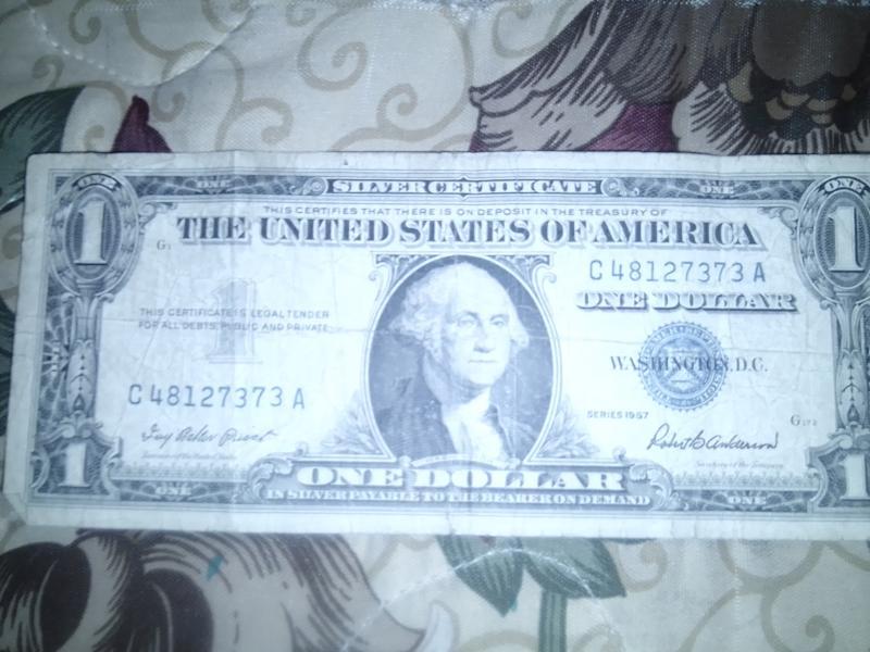 It's a 1957 Silver dollar bill