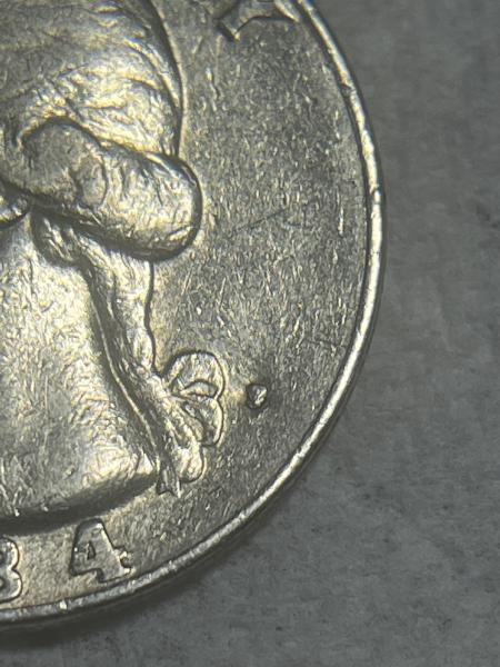 1984 quarter unreadable mint mark