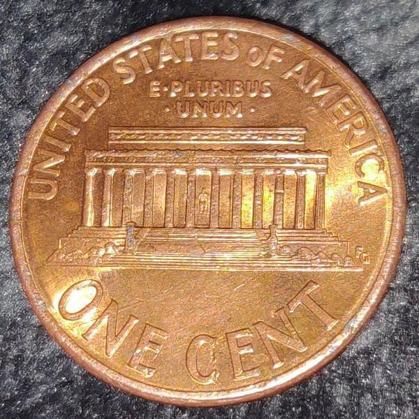 Two pictures of one penny with flash on&hellip;
