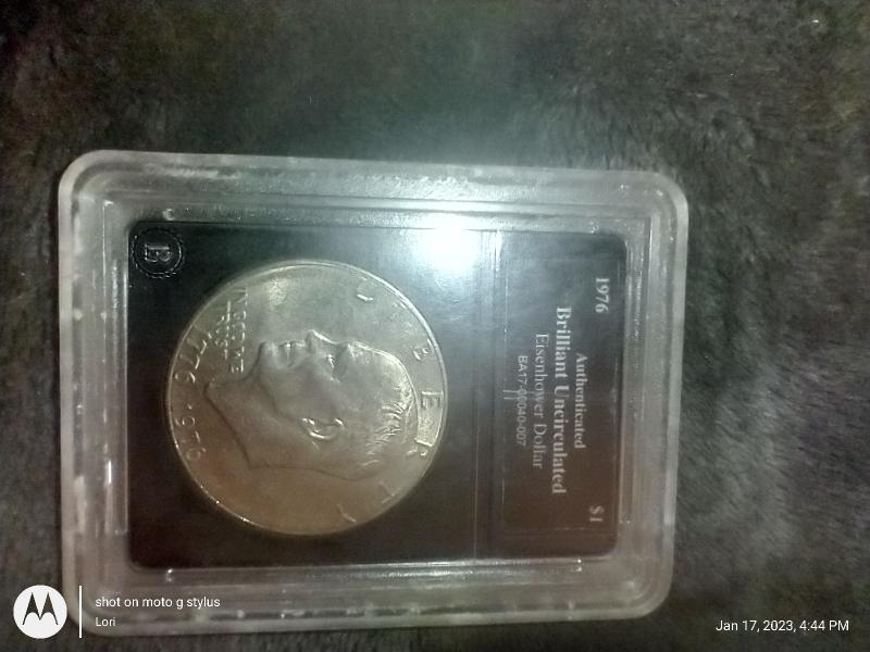 Authenticated brilliant uncirculated Eisenhower dollar BA 17-000 40-007