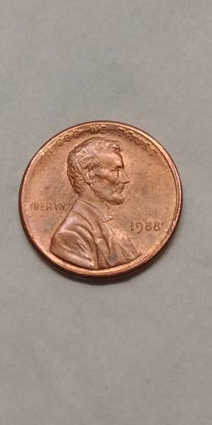 1988 penny , L in LIBERTY on rim…