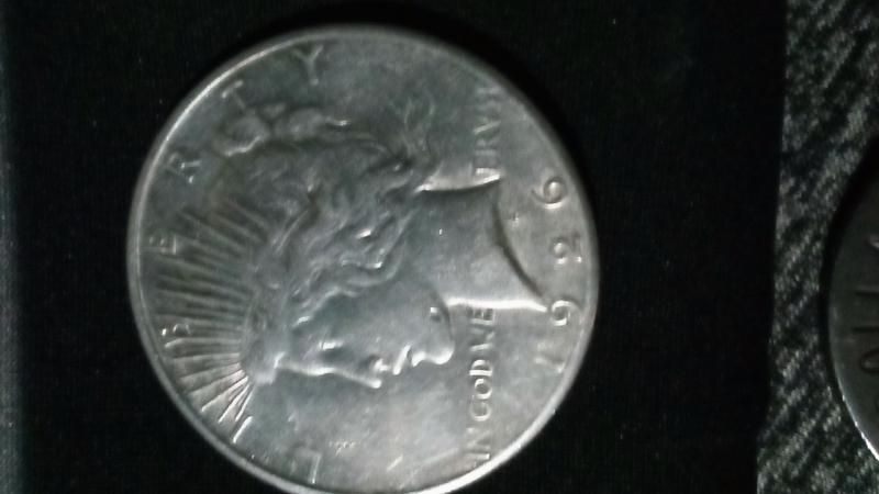 Old silver dollars paper and coin