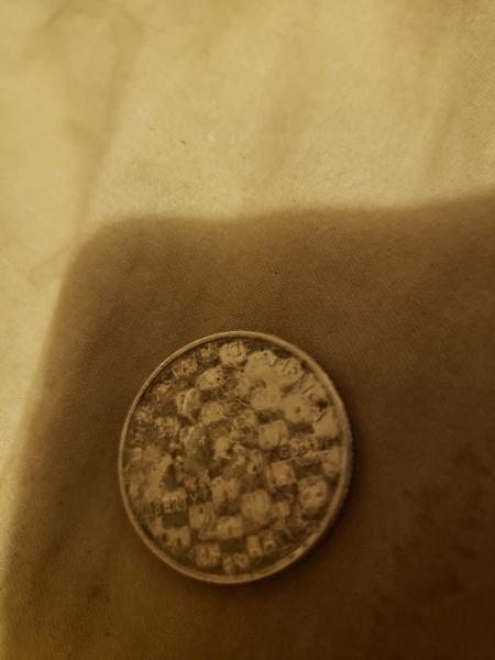 2001 Kentucky state quarter with a strike through&hellip;