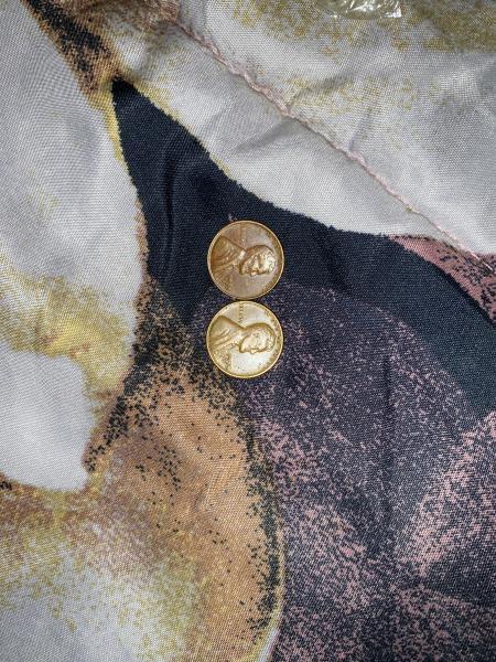 Both are 1955 d Lincoln head pennies with…