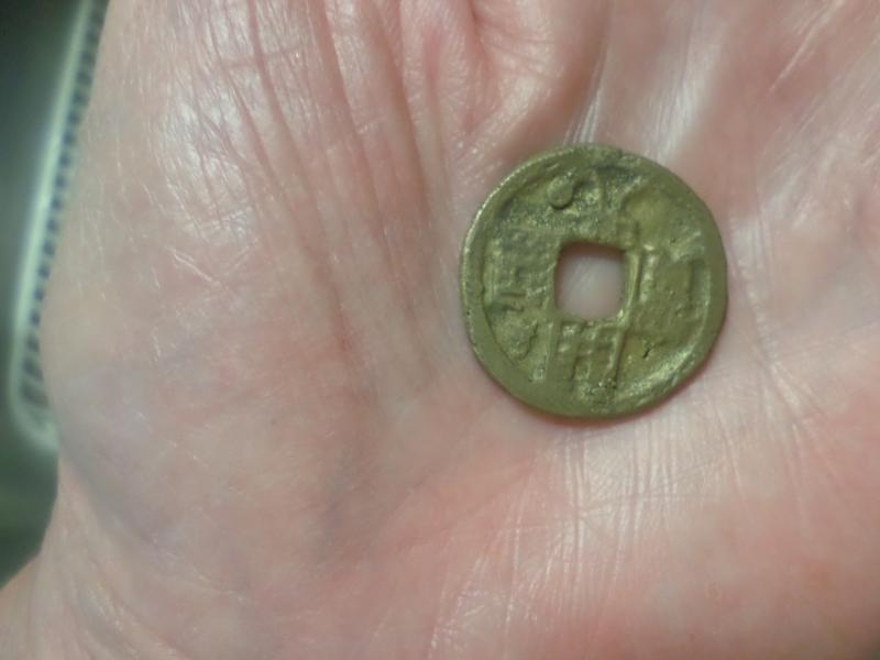 Old Chinese coin Size of a quarter. Smooth&hellip;