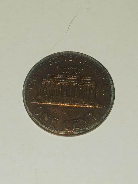 1992 penny around the rim front and back