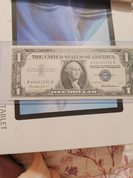 A one dollar silver certificate with the serial&hellip;