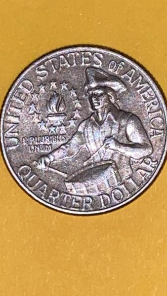Bicentennial Drummer Boy Quarter , the drum looks…