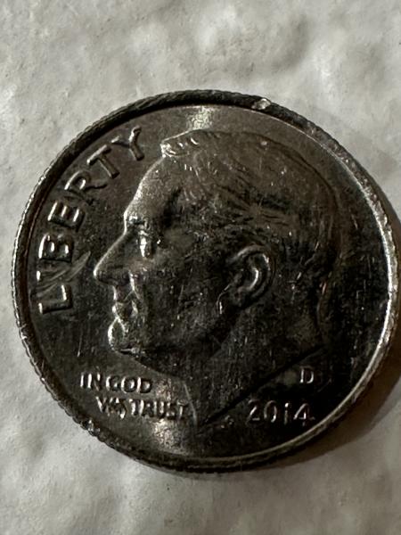 This is a 2014 Dime D mint and…