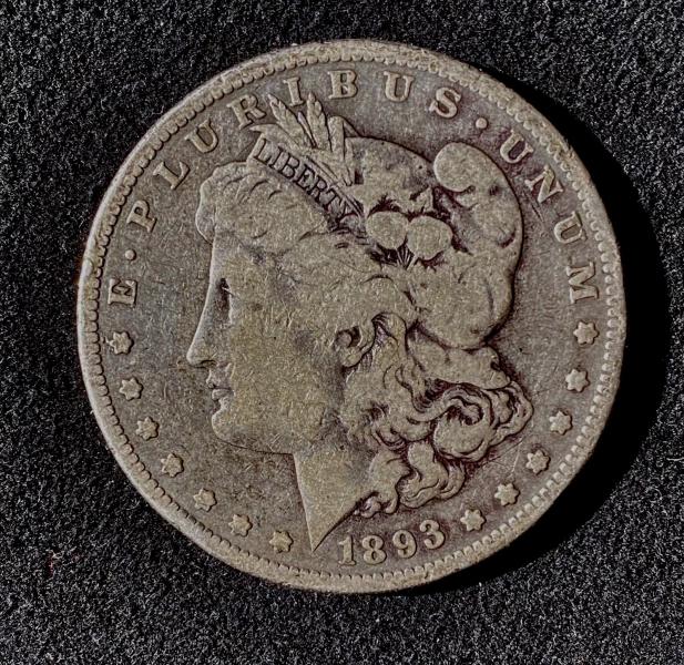 1893 s Morgan silver dollar ￼ ￼