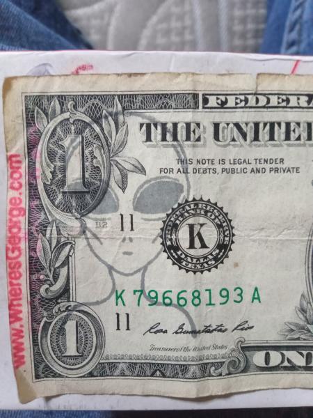 Doller bill with alien on front an back&hellip;