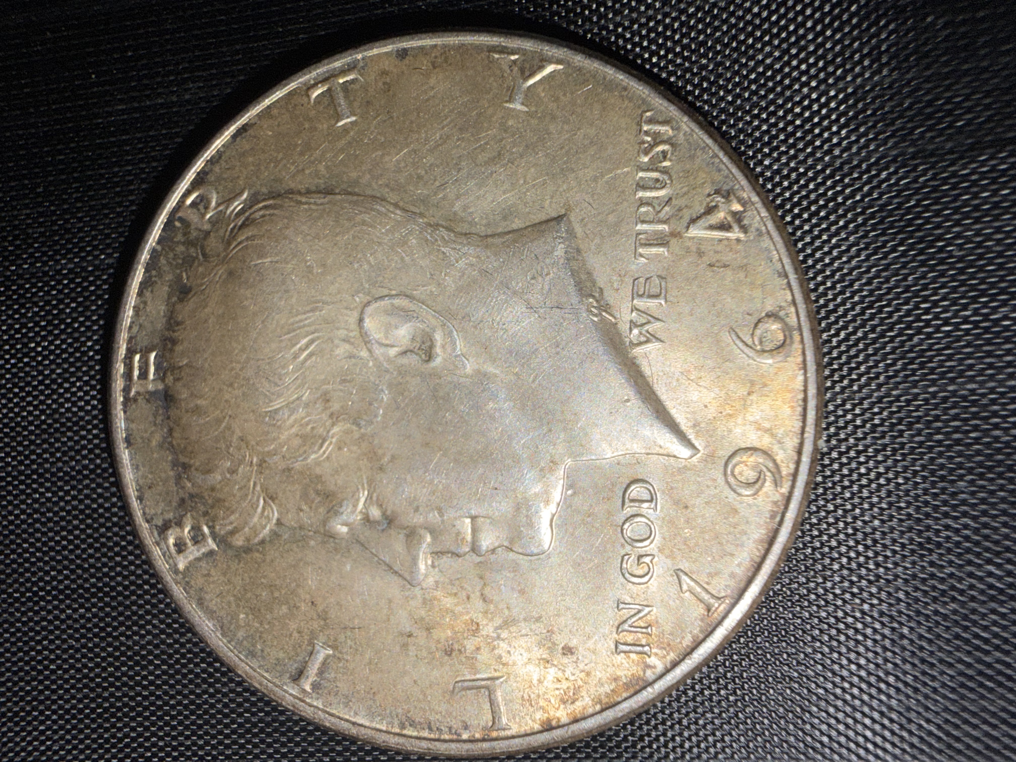 1964 Kennedy half dollar.